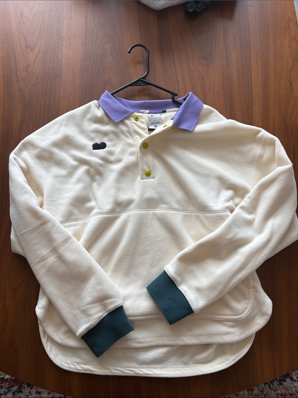 Nike Cream Long-Sleeve Polo with Lavender Collar and Teal Cuffs